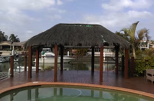Poolside gazebo with its original brushwood roof